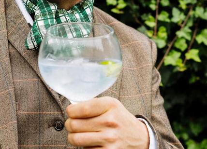 An image of a man holding a glass of water, Private Online Group Gin Tasting. Nautilus Bar