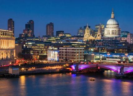 An image of a city at night, Champagne Afternoon Tea in one of London’s most iconic buildings. OXO Tower Restaurant