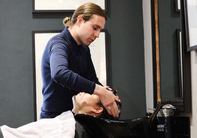 An image of a woman getting her hair done, Haircut and Classic Shave. Pankhurst London