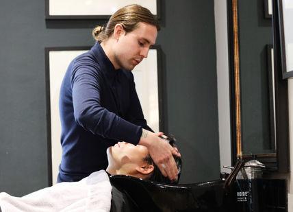 An image of a woman getting her hair done, Haircut and Classic Shave. Pankhurst London