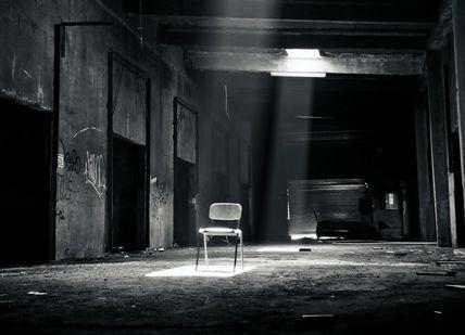 An image of a chair in an abandoned building, Kidnap, Capture and Evasion Experience. Parker Lee Events