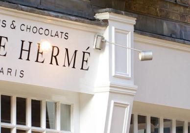 An image of a store front with a sign, Belgravia. Pierre Hermé