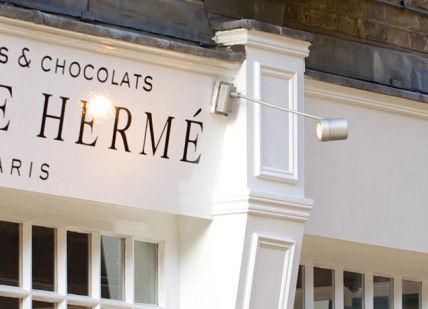 An image of a store front with a sign, Belgravia. Pierre Hermé