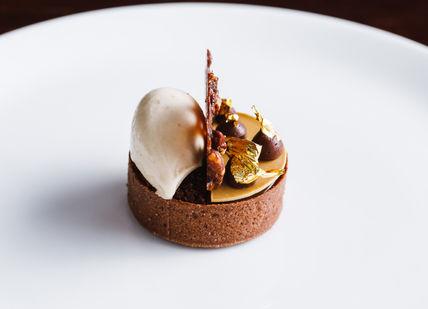 An image of a dessert on a plate, £250 credit towards the bill. Purnell's