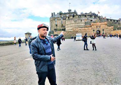An image of a man flying a kite, Private Royal Mile Old Town Tour and Indian Dinner. Rishi's Edinburgh Tours