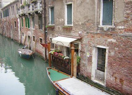 An image of a canal in venice, Six-course Tasting Menu. Ristorante Osteria Da Fiore