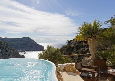 An image of a pool with a view of the ocean, Romantic Getaway Tour In Alicante And Ibiza. On The Road- Spain