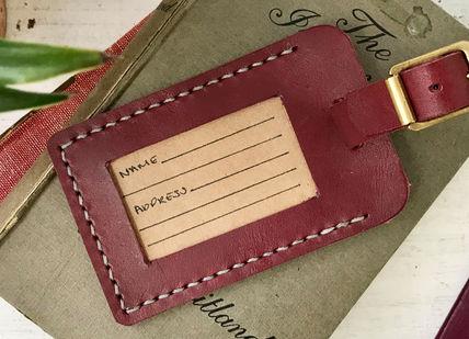 An image of a passport and a passport case, Make Your Own Leather Accessories. Rosanna Clare