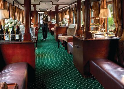 An image of a train car with leather seats, Durban to Victoria Falls Trip. Rovos Rail