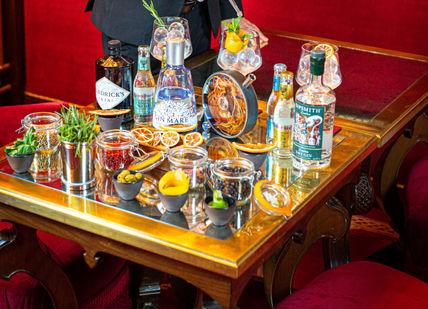 An image of a man that is pouring something, Gin & Tonic Tasting. The Rubens at the Palace - The New York Bar