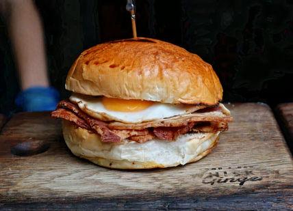 An image of a bacon and egg sandwich, London Bridge Secret Food Tour. Secret Food Tours