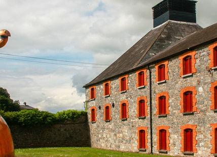 An image of a building with a giant copper pot, Two-Night Irish Whiskey Break. Secret Ireland Escapes