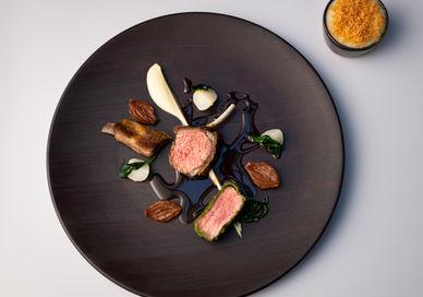 An image of a plate of food on a table, Gourmand Tasting Menu With Signature Wine Pairing. Seven Park Place by William Drabble