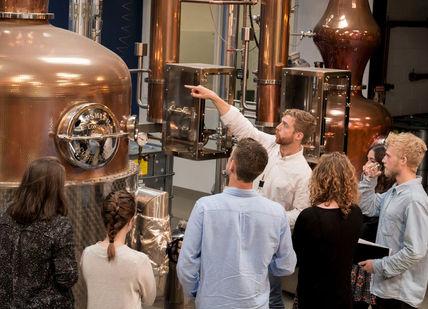 An image of a group of people in a brewery, Distillery Tour and Gin Tasting. Sipsmith Distillery