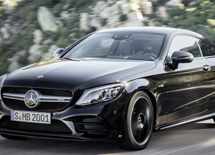 An image of the mercedes s - class coupe driving on a road, Premium car hire from Gare du Nord. SIXT Car Hire