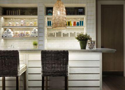 An image of a kitchen with a bar, Repose Aromatherapy Facial. Soholistic Spa at Ham Yard Hotel