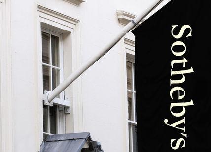 An image of a black and gold sign on a building, An Exclusive Behind-The-Scenes Tour of Sotheby's. Sotheby's