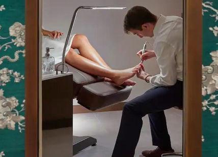 An image of a man sitting on a toilet, Youth and Beauty Package. The Spa at Mandarin Oriental