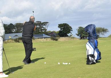 An image of a man playing golf, Golf Lesson and Supervised Play. St Andrews Golf Academy