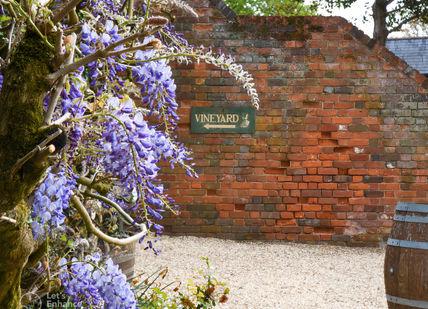 An image of a brick wall with a sign, Public Vineyard & Winery Tasting Tour. Stanlake Park Wine Estate
