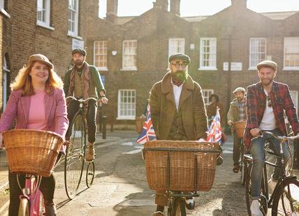 An image of a group of people riding bikes, Bike Ride and Gin Tour. Tally Ho