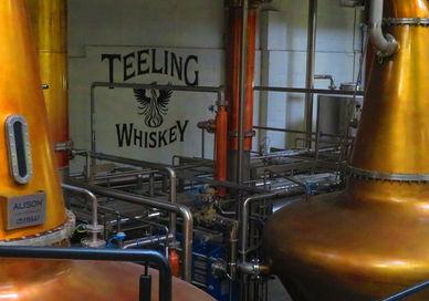 An image of a brewery with copper colored tanks, Dublin, Ireland. Teeling Whiskey Distillery