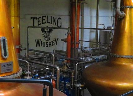 An image of a brewery with copper colored tanks, Dublin, Ireland. Teeling Whiskey Distillery