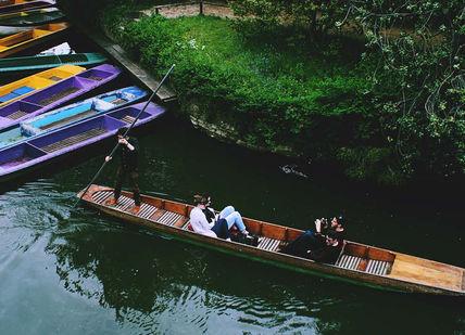 An image of a group of people in a boat, Weekday Private Punting Tour and Cream Tea. Traditional Punting Company