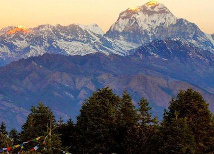 An image of the himalayas mountains at sunset, 11-Day Nepal Trekking & Jungle Safari. Trekking Guide Team Adventure