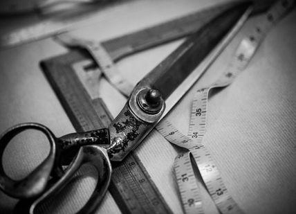 An image of a pair of scissors and a ruler, Create Bespoke Shirts. Turnbull & Asser - London