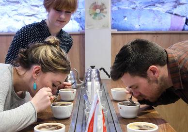 An image of a man and woman eating coffee, Introduction To Speciality Coffee. Union Brew Lab