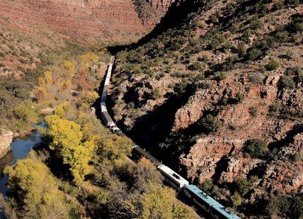 An image of a train going through a canyon, Canyon Railroad Ride. Verde Canyon Railroad