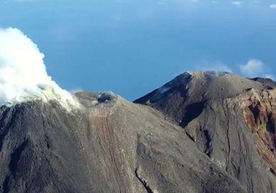 An image of a mountain with clouds in the sky, Luxury Four-Night Indonesian Escape. Volcano Discovery