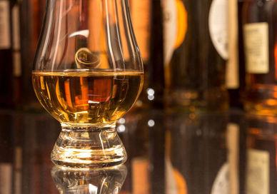 An image of a glass of whisky, Premium Whiskey Tasting. Whiski Rooms