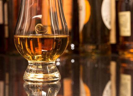 An image of a glass of whisky, Premium Whiskey Tasting. Whiski Rooms
