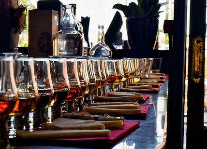 An image of a restaurant setting with wine glasses, Edinburgh, Scotland. Whiski Rooms