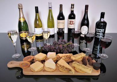 An image of a wine and cheese platt, Luxury Wine Tasting Experience. Wine Cottage