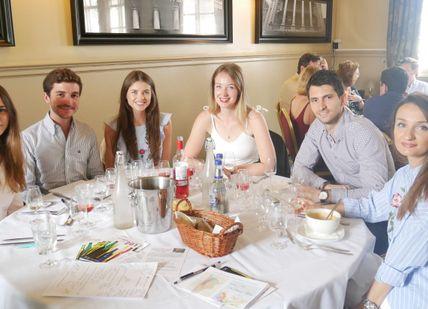 An image of a group of people sitting at a table, Two Tickets to a Full-Day Wine Tasting Masterclass. Winfield Wine Tastings London