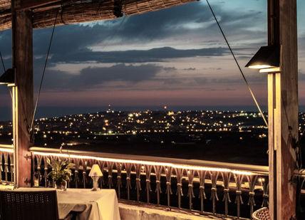 An image of a restaurant with a view of the city, Three-Night Romantic Getaway. The Xara Palace