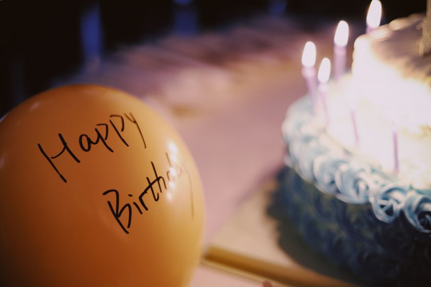 Happy Birthday cake and balloon