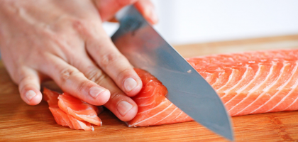 Salmon sashimi being cut sushi masterclass