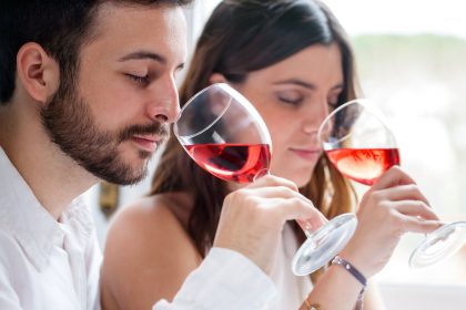 Couple enjoying wine tasting masterclass