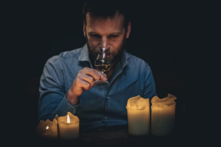 Man smelling whisky in whisky tasting experience