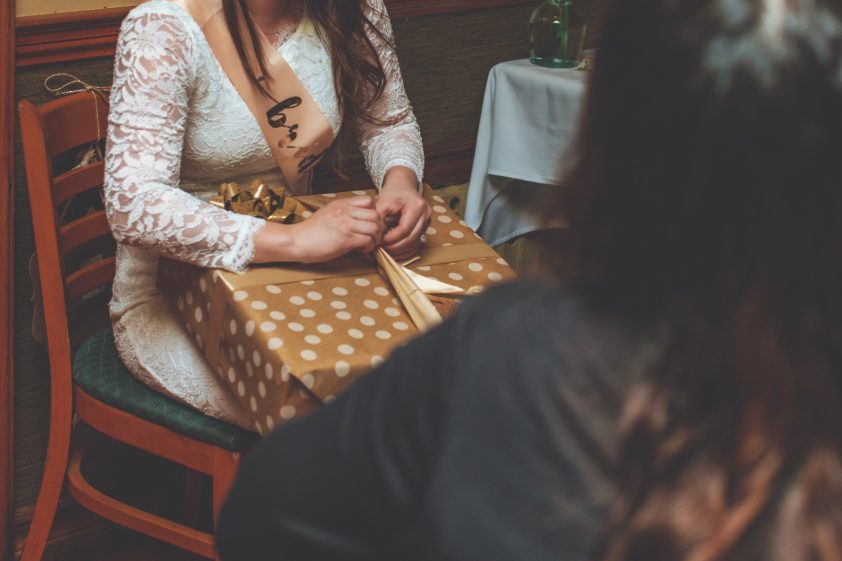 Bride-to-be opening gifts at Bridal Shower
