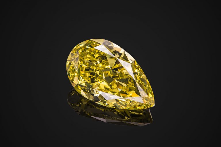 Pear cut yellow diamond transparent gemstone