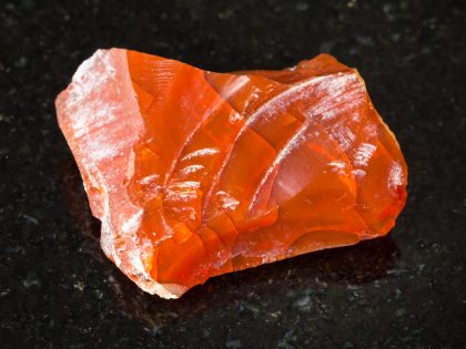 Rough fire opal gemstone from Ural Mountains