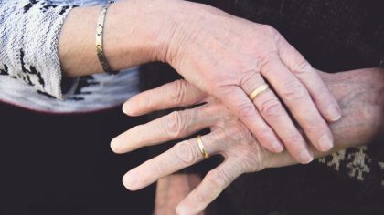 55th wedding anniversary photo featuring their wedding rings