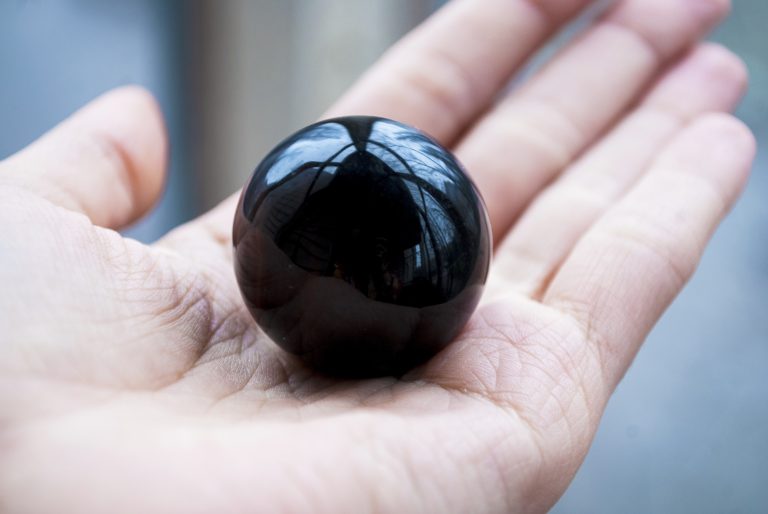 black obsidian on hand