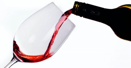 pouring wine into a glass