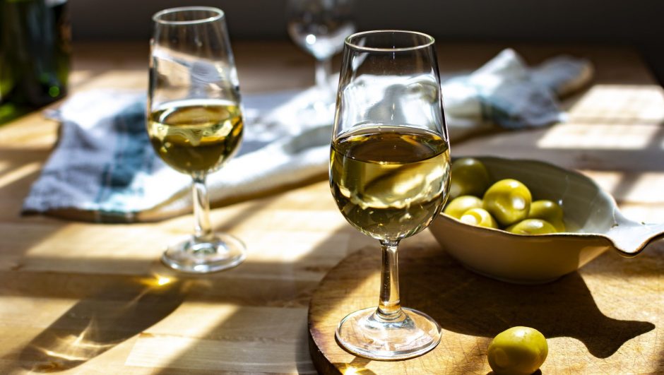 Sherry wine tasting, dry fino, manzanilla or palomino jerez fortified wine in glasses, Jerez de la Frontera, Andalusia, Spain close up
